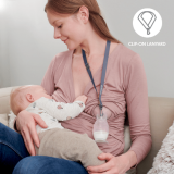 Breastfeeding with breast milk collector
