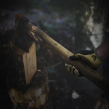 Rancher Chopping Wood